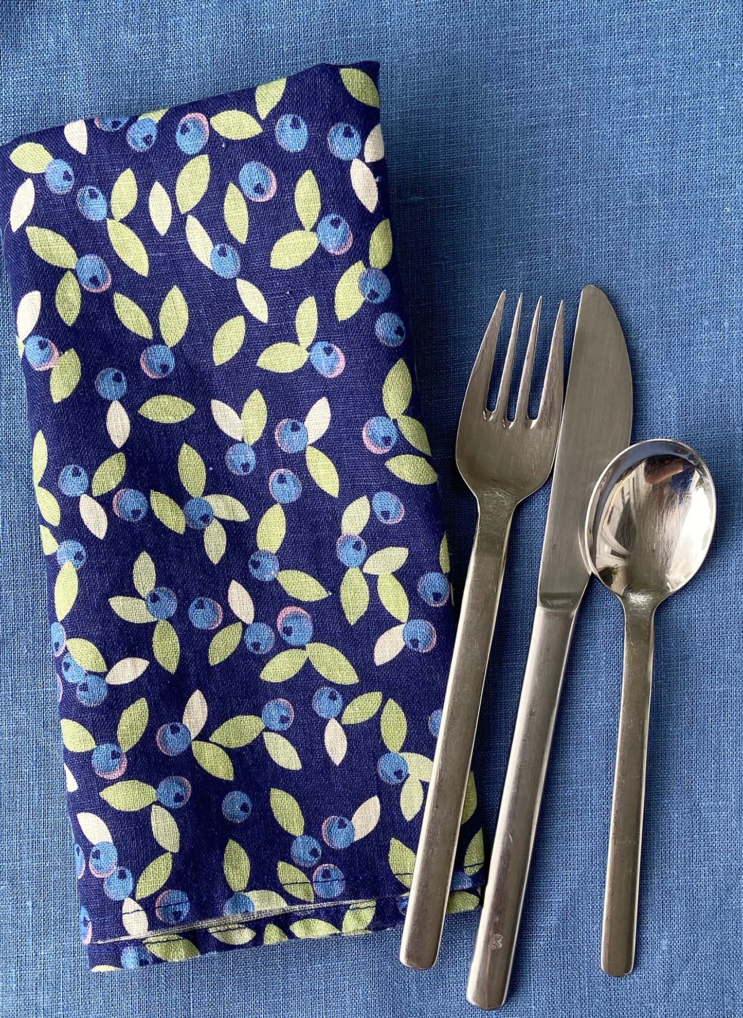 Be Wild sets a vibrant summer table with wild blueberry 100% linen napkins! Set of 2.