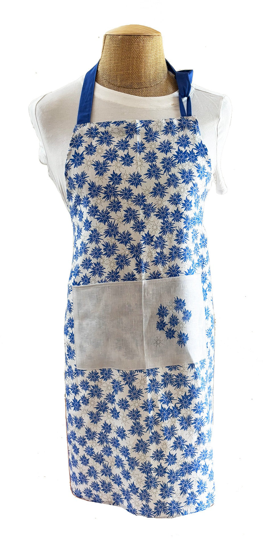 Rukki Fields of windswept cornflower 100% linen aprons. Available in two sizes, adult and child.