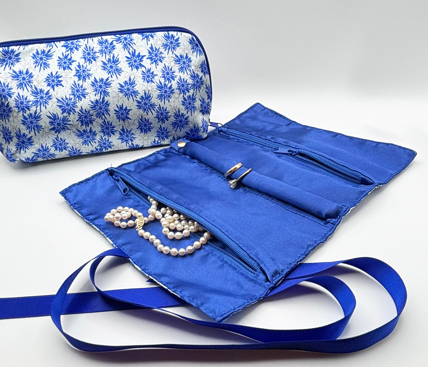 Satin Jewelry Roll and Make-up Bag set. Available in 3 patterns.