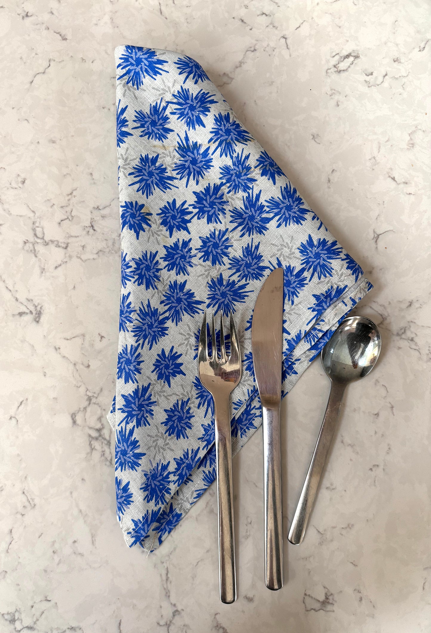 Rukki Fields 100% linen cheerful cornflower napkins set a perfect summer tabletop. Set of 2.