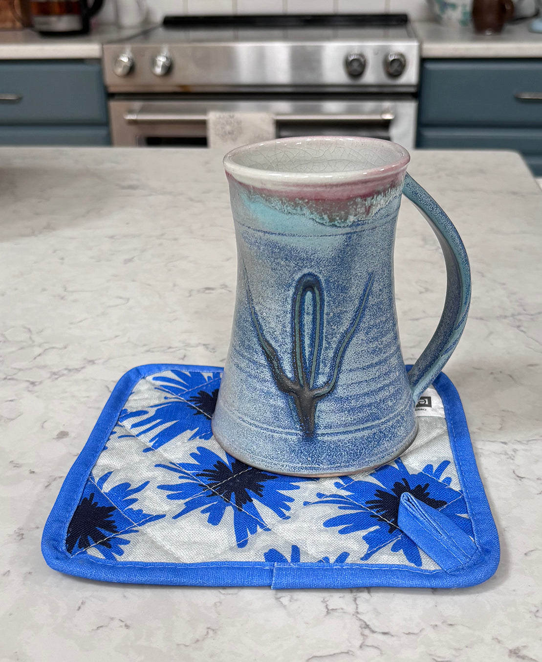 Mighty Blue scandi-style big bold cornflower 100% linen potholder brightens any kitchen.