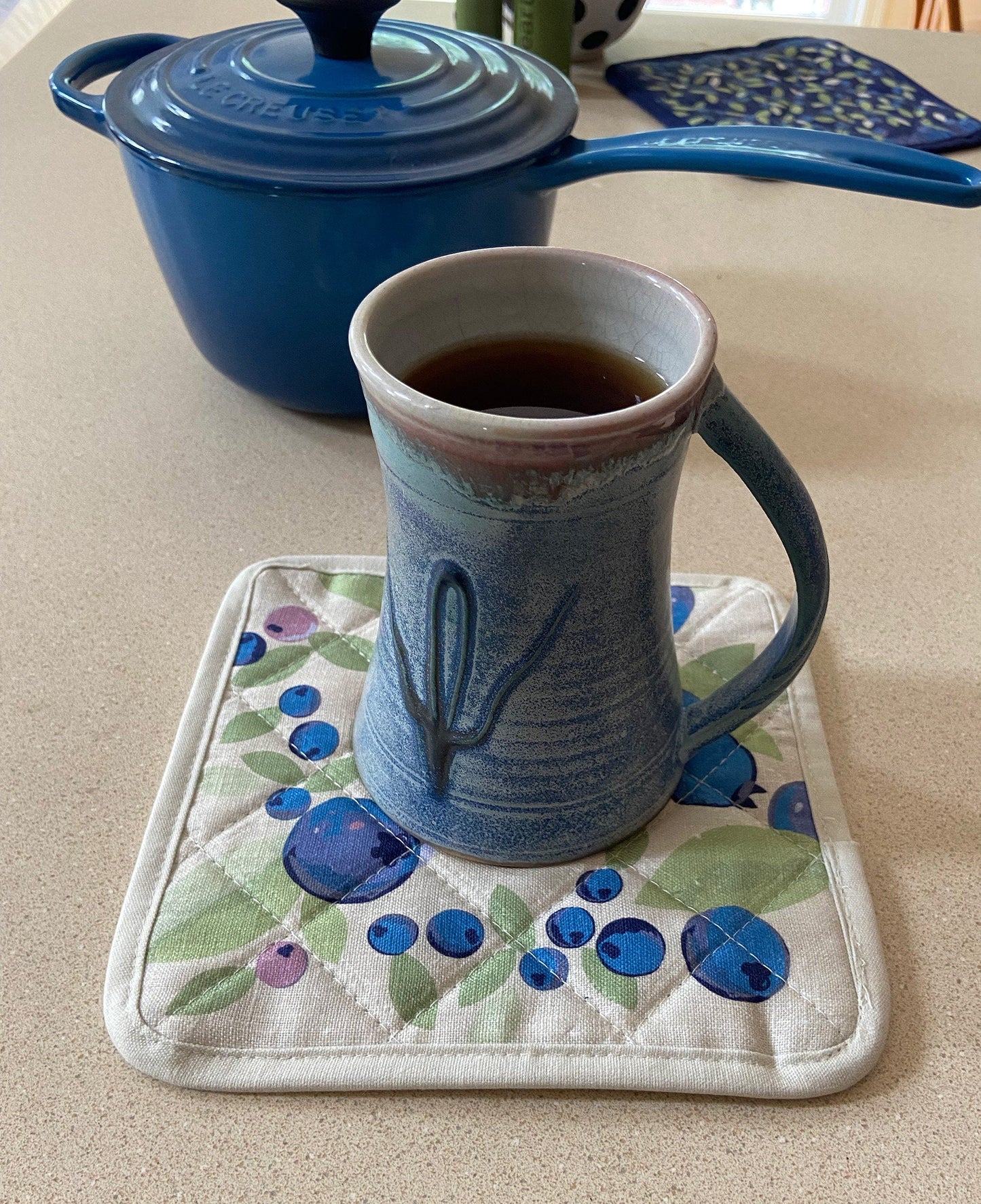 A Scandi-style big bold blueberry linen pot holder will brighten up any kitchen! Perfect hostess housewarming gift. A unique and useful gift