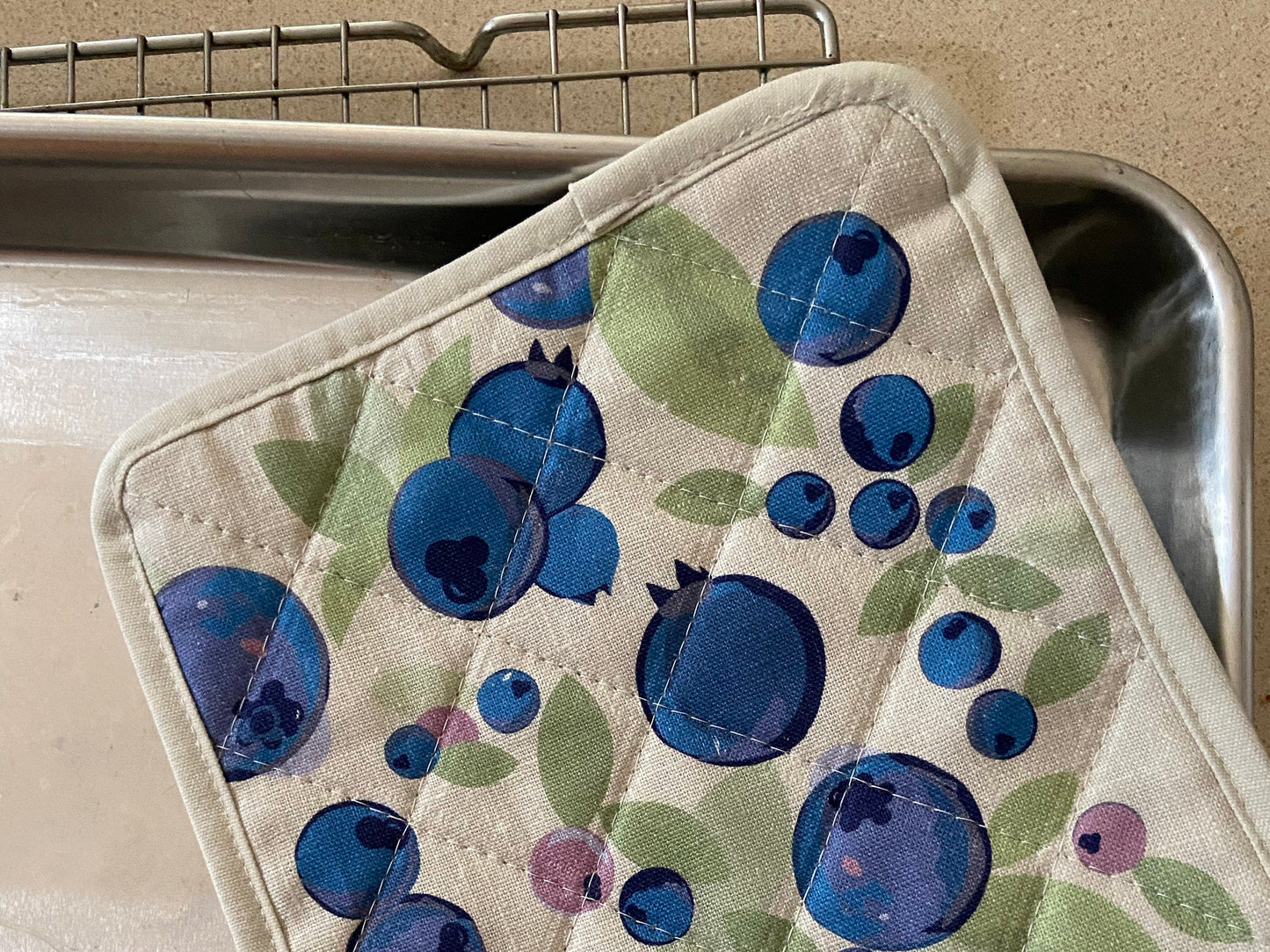 A Scandi-style big bold blueberry linen pot holder will brighten up any kitchen! Perfect hostess housewarming gift. A unique and useful gift