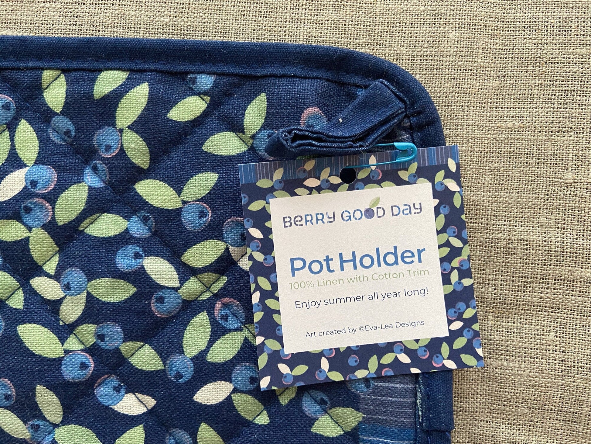 Brighten up any kitchen with a field of wild blueberries linen pot holder! Perfect hostess housewarming gift. A unique and useful gift